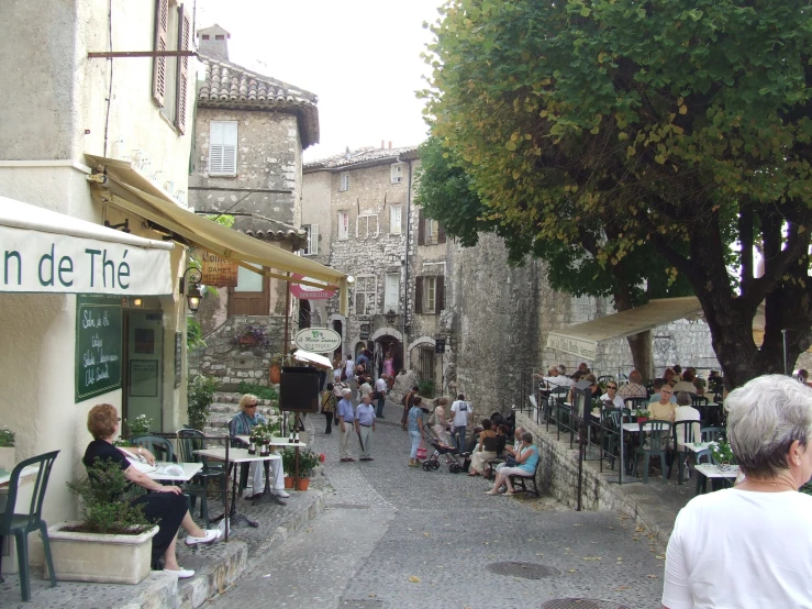 people at an open area in a french city