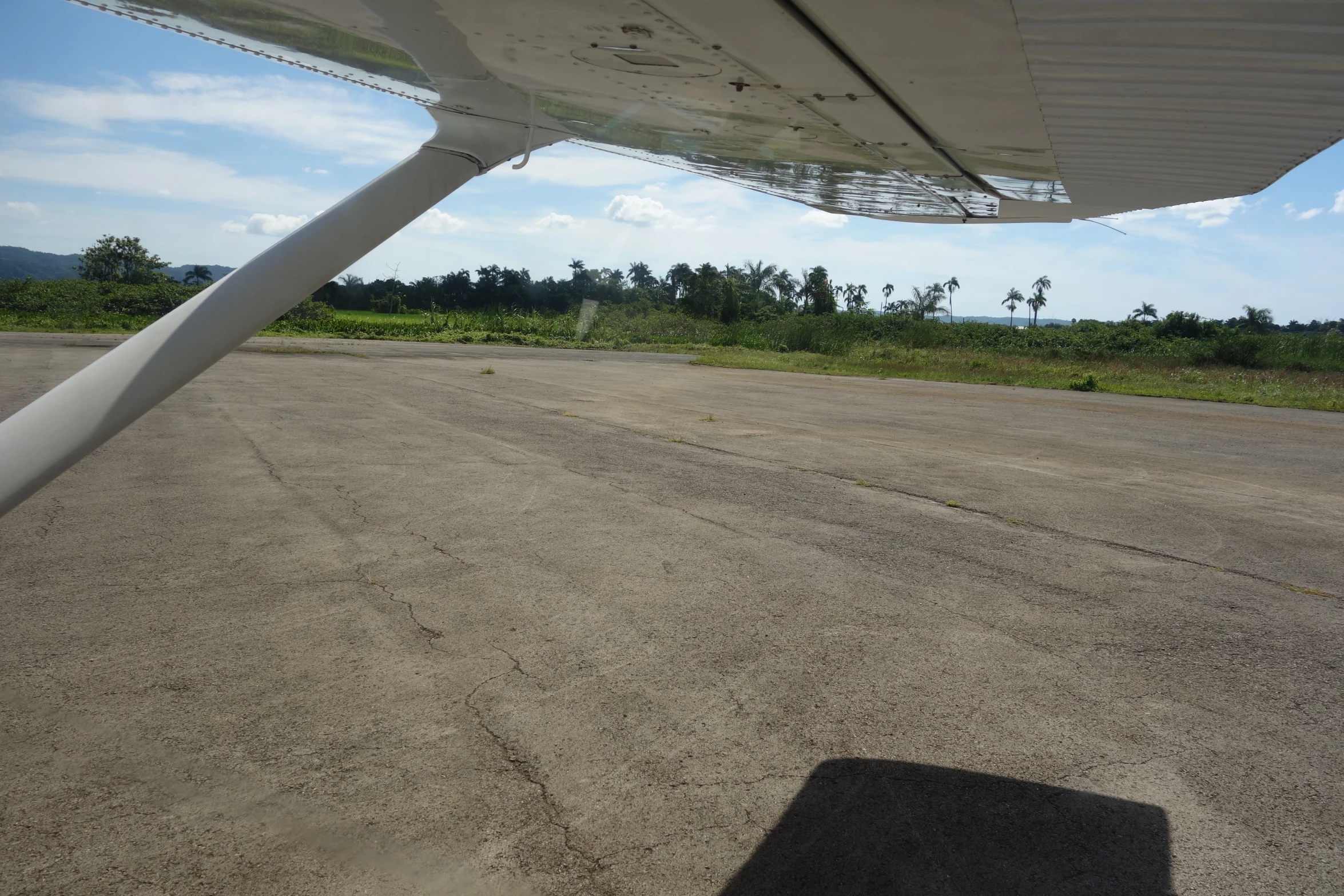 an aerial view of the bottom wing of a plane