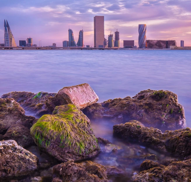 there is a sea shore with many rocks