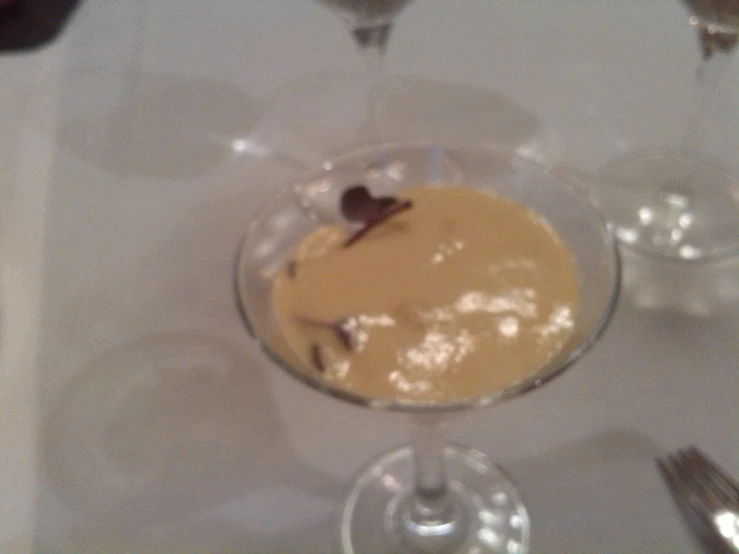 an image of dessert in wine glass on the table