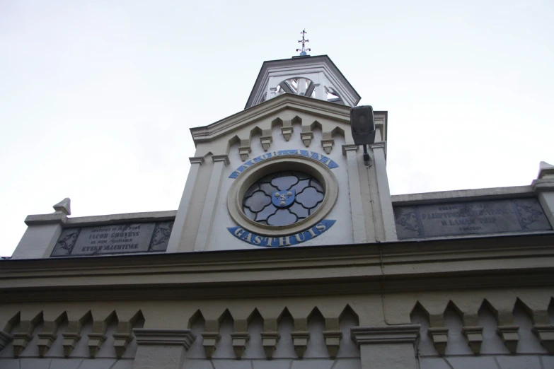 an outside view of a church and its clock