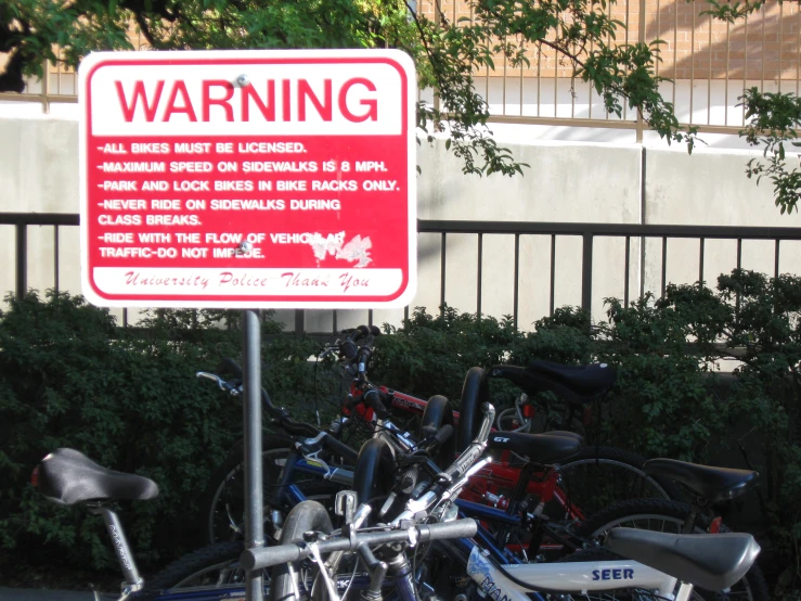 there are many bikes parked next to each other