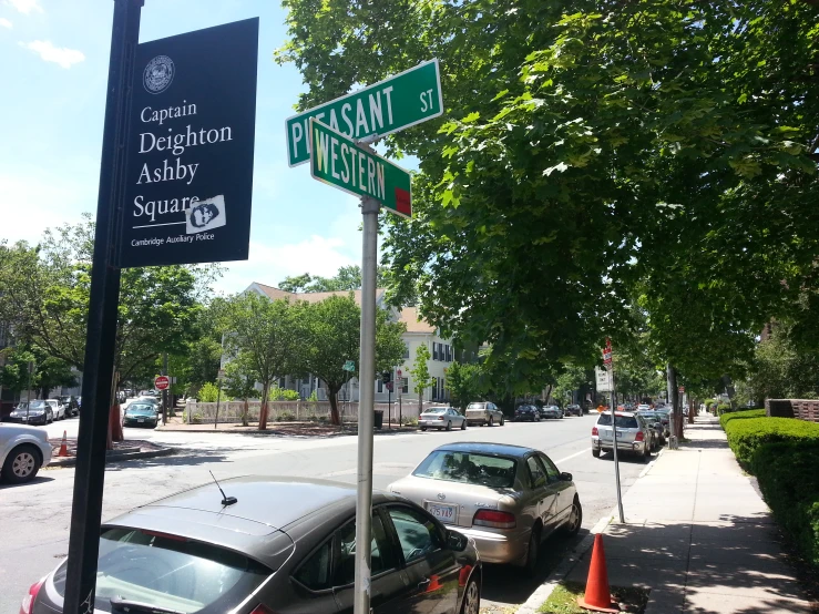 street signs showing the intersection with streets and sidewalks