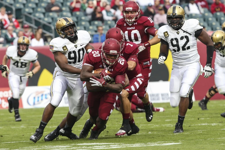 an image of a team running together on the field