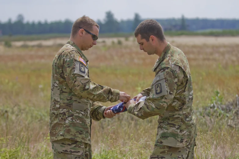 two soldiers are playing in the field