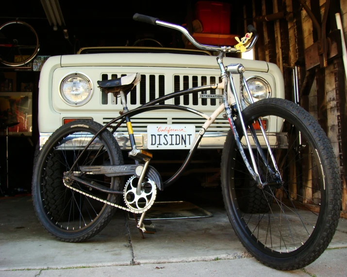 there is a bike attached to the front wheel