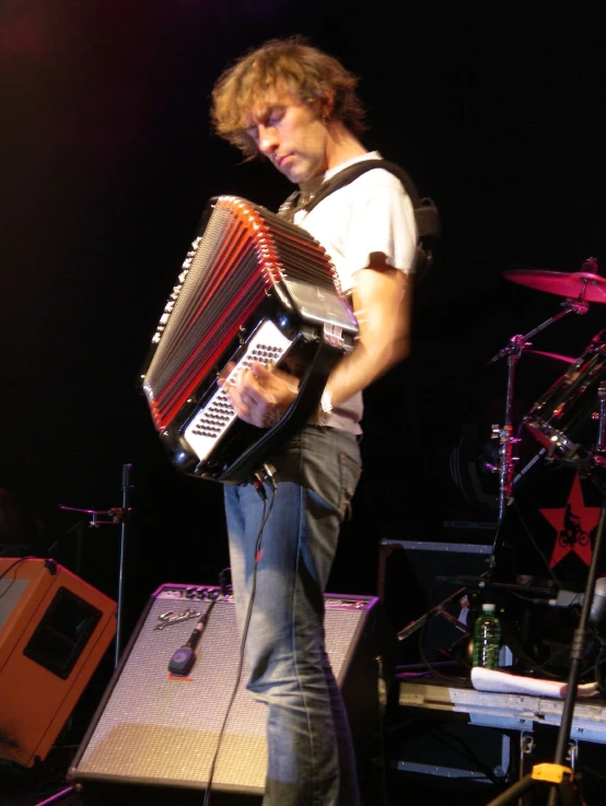 an image of man playing a musical instrument