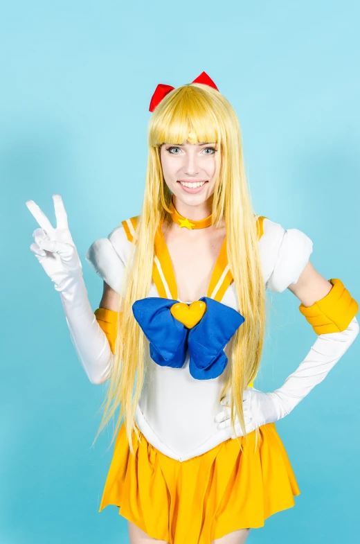 a woman dressed in a sailor costume and doing a peace sign