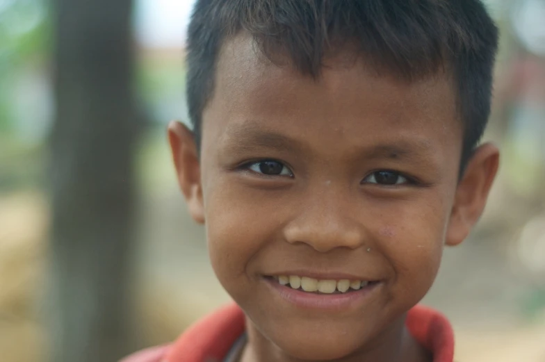 a little boy that is posing for a picture