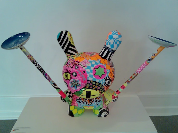 a sculpture of a bunny head with two skis