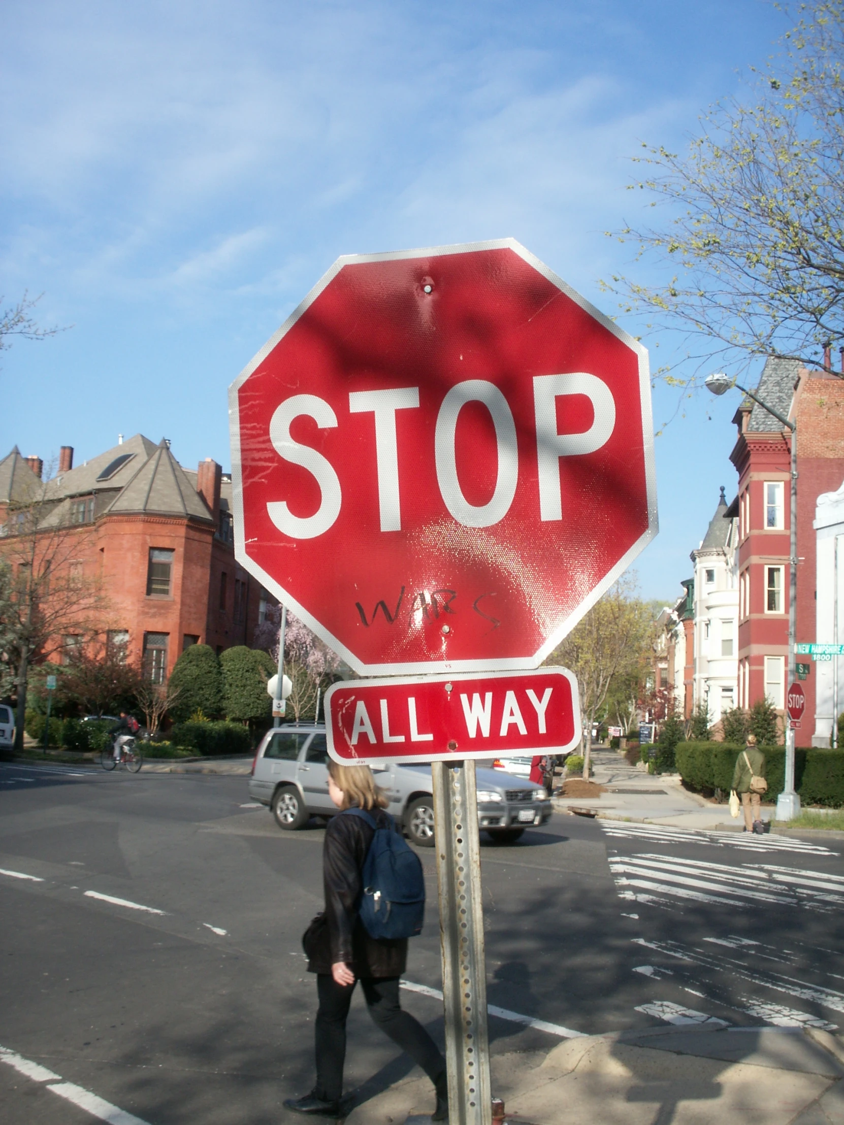 a red stop sign with all way written underneath it