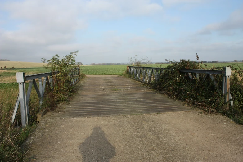 a bridge that is on a small road