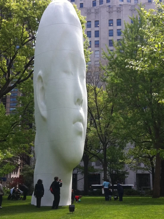 an image of a giant sculpture in the middle of a park