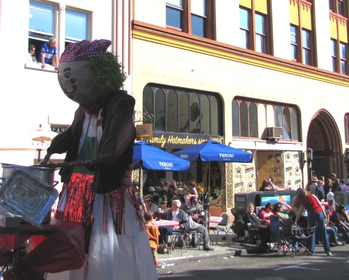 a person dressed in a costume on the street