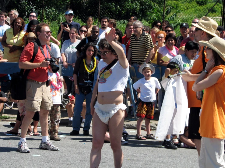 a group of people watching people in a crowd