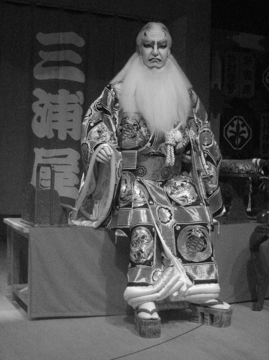 black and white image of a chinese god