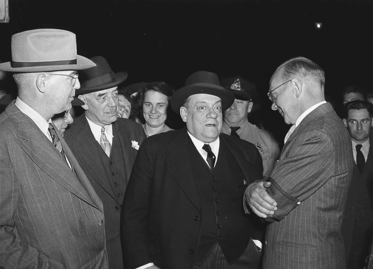 a group of men who are standing near each other