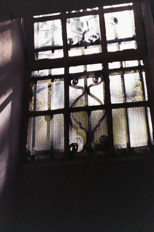 looking up at the inside of a stain glass window