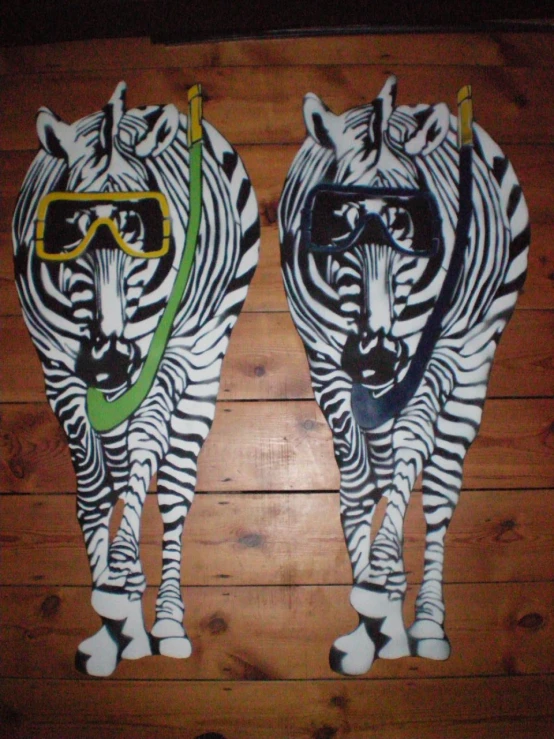 a pair of cut outs of zes on the floor