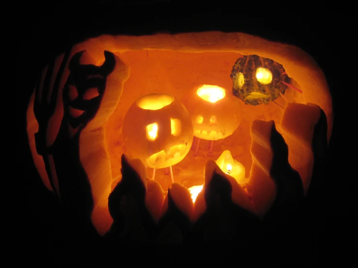 a carved pumpkin features lights inside of it