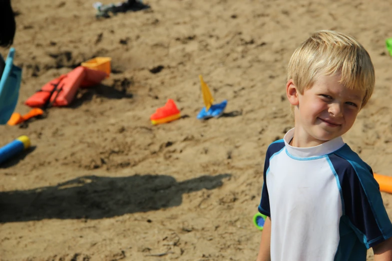 there is a  standing on the beach