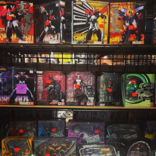 a display case of comic books is stocked with comics