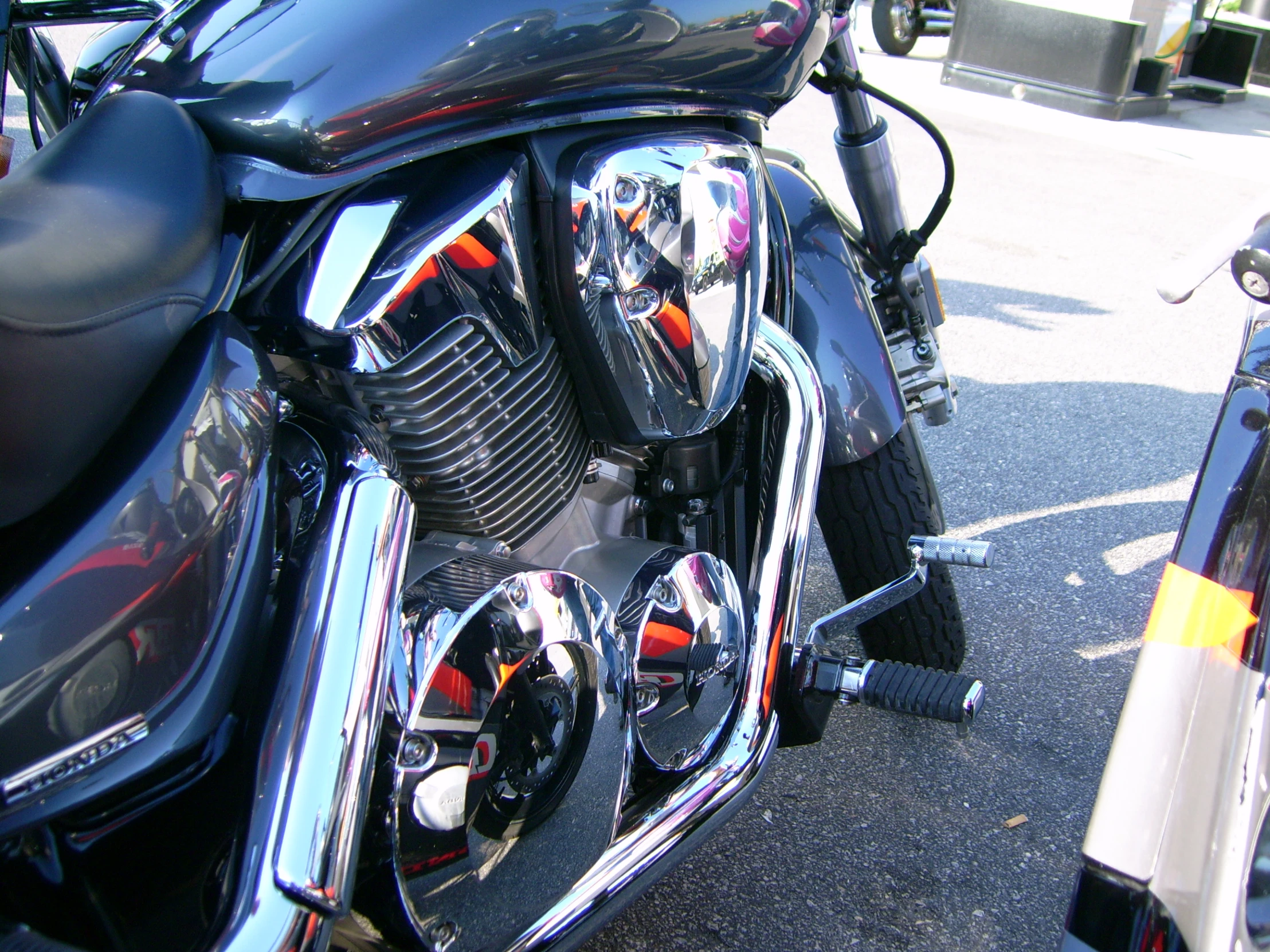 the front end of a motorcycle parked on the road