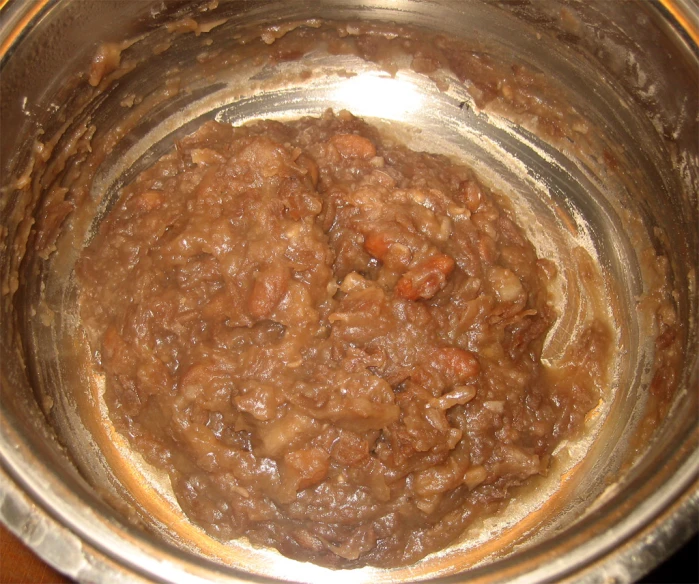 this is a big metal mixing bowl full of food