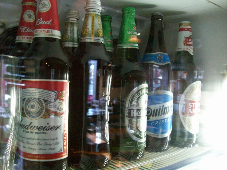 a display shelf full of different types of beer