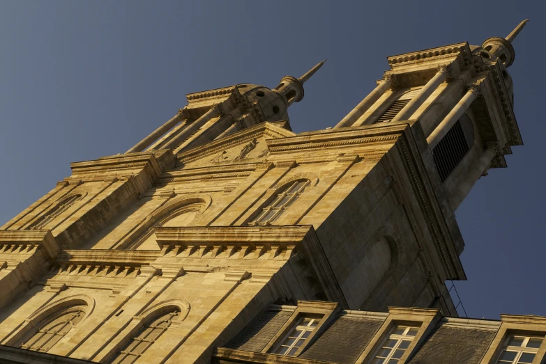 a view of an old, intricate, cathedral building from the ground