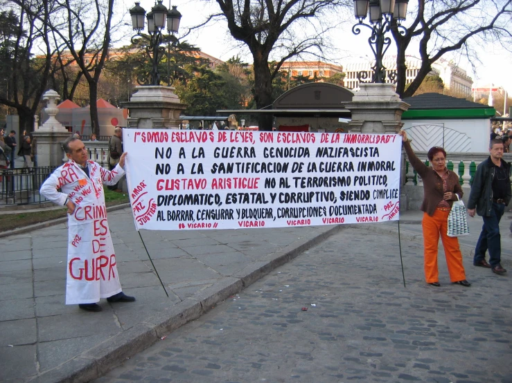 some people that are holding a protest sign