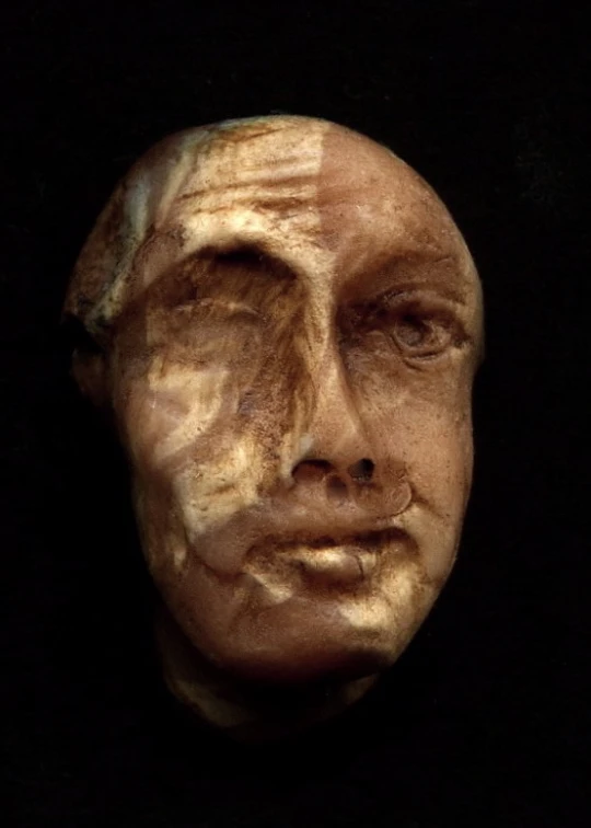 a face statue is made with plaster