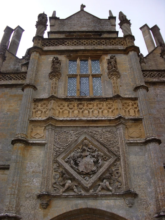 a large building with many carvings and arches