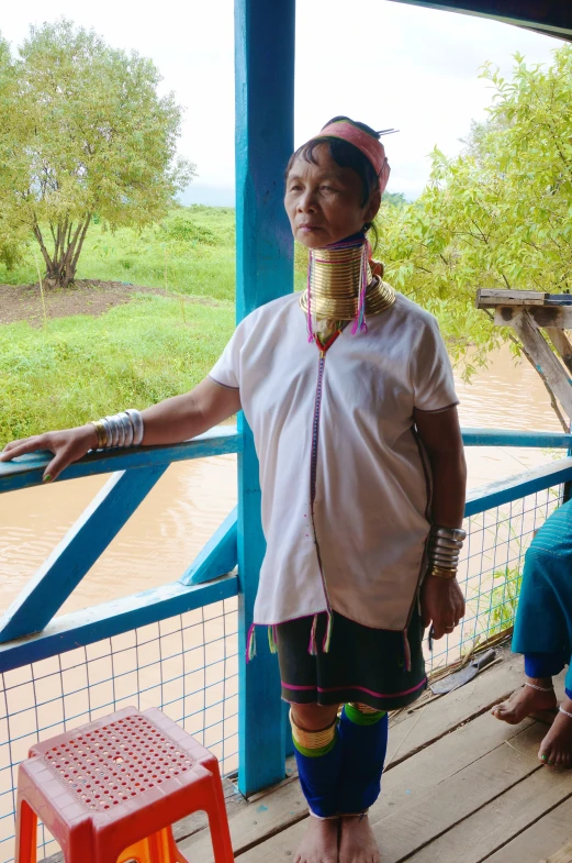 a woman with a neck piece over her mouth