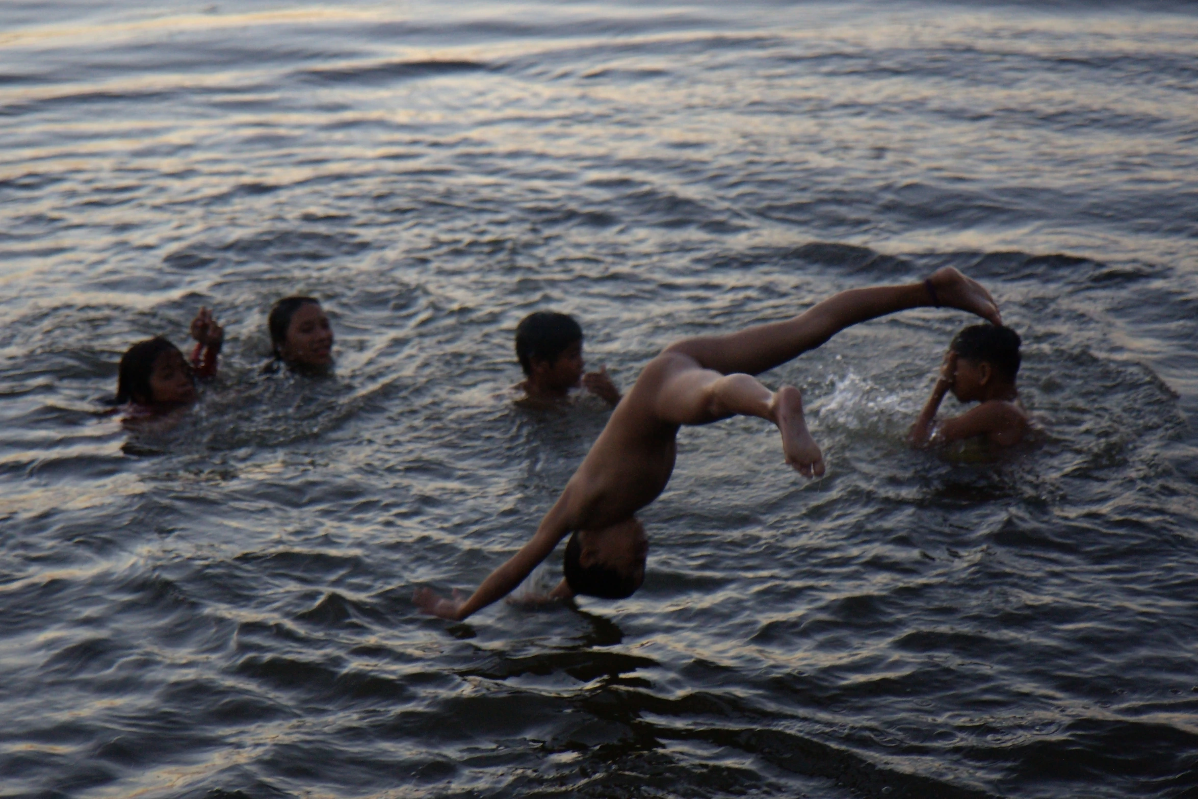 a couple of people are in the water