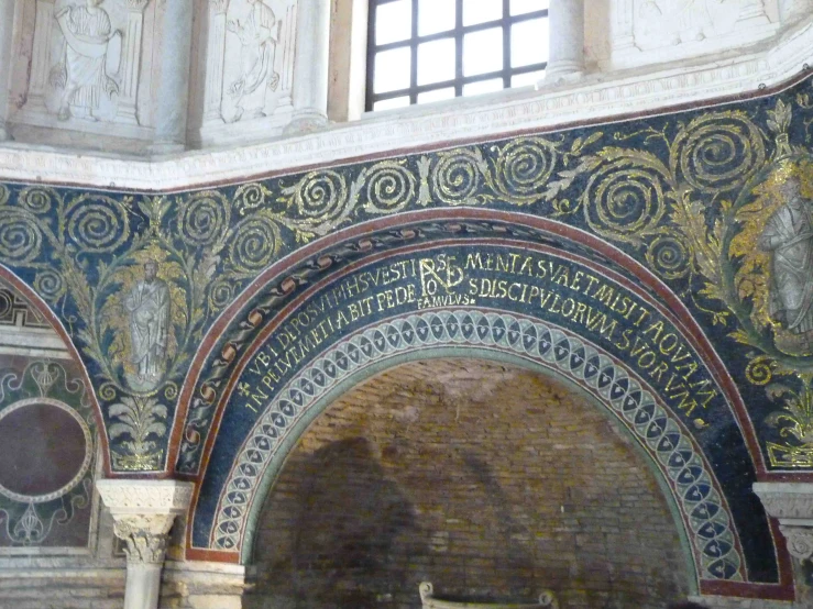 a stone archway inside an old church