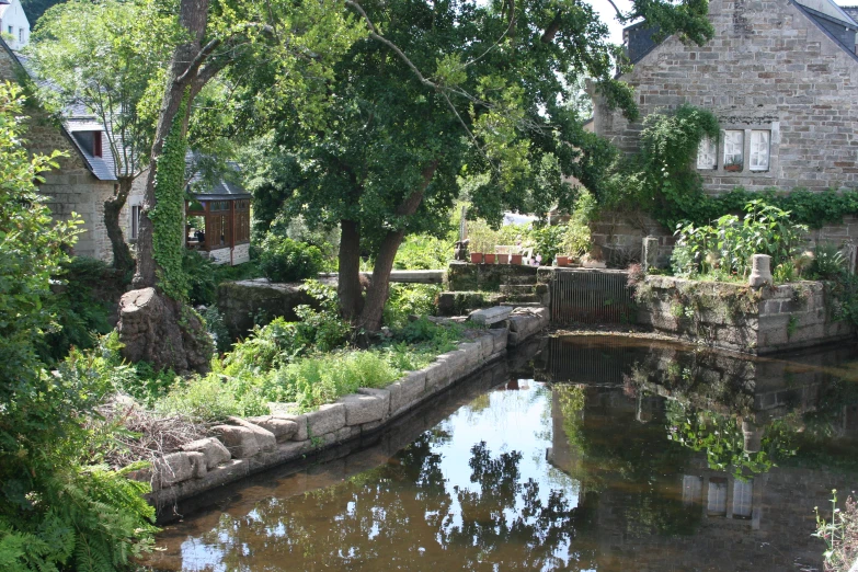 a manmade stream is pictured in the distance