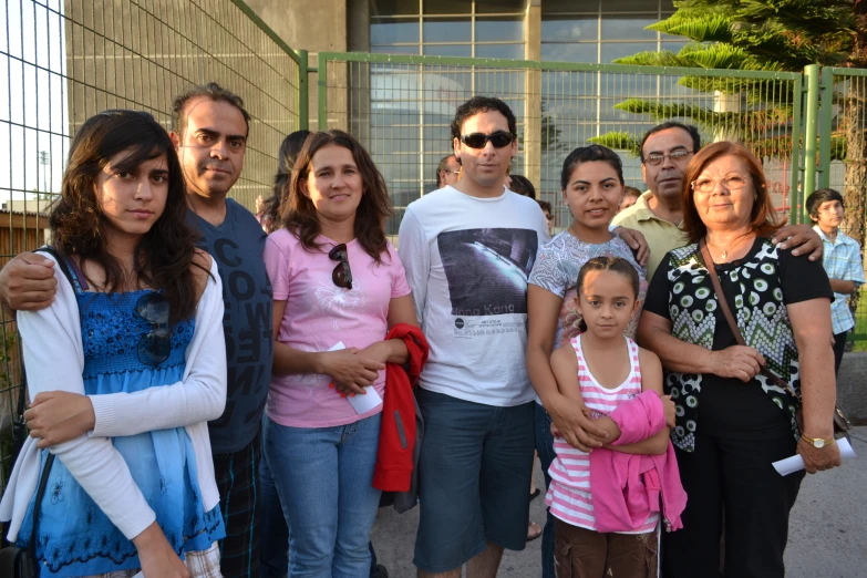 a group of people in front of a building