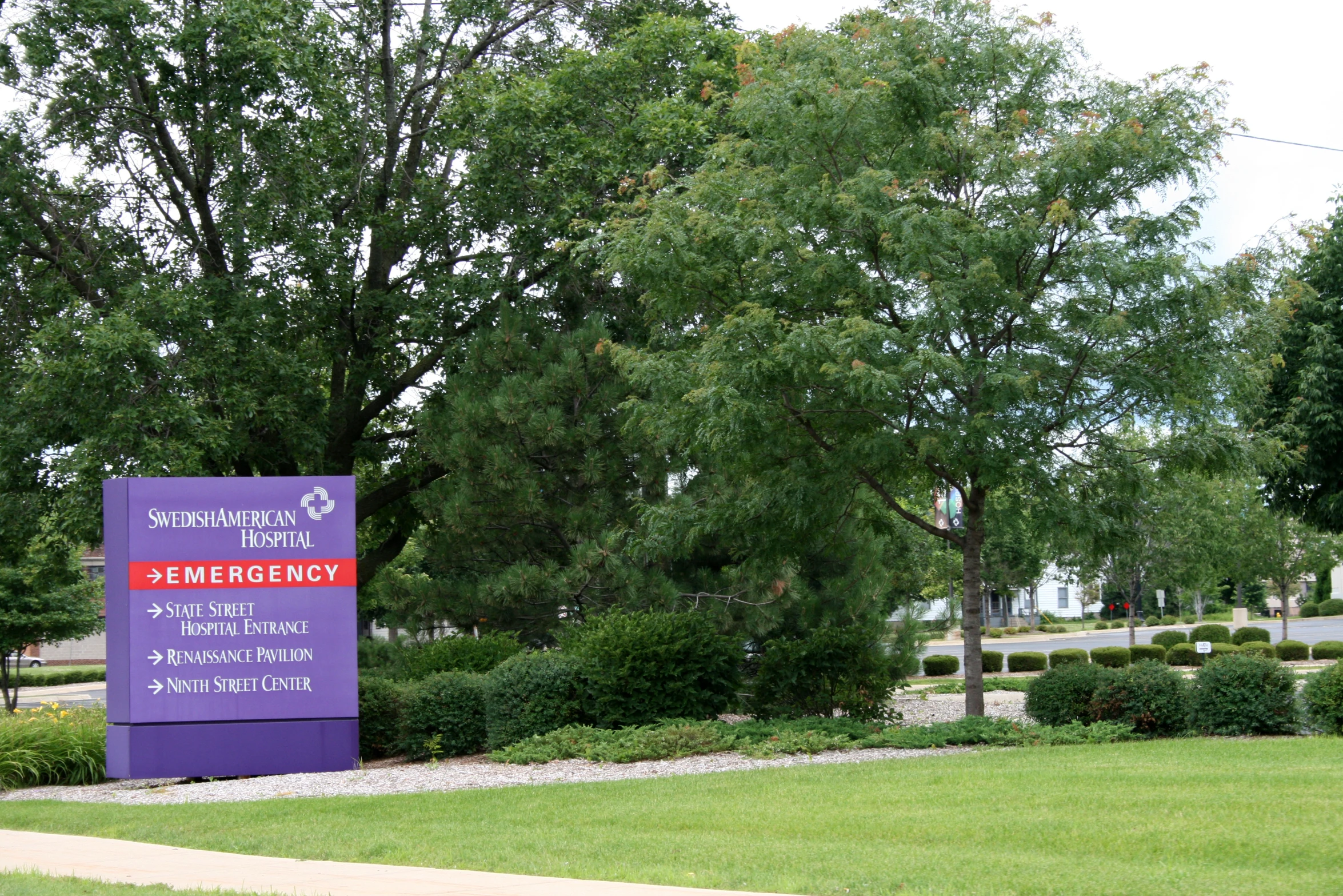 the sign in front of a field reads