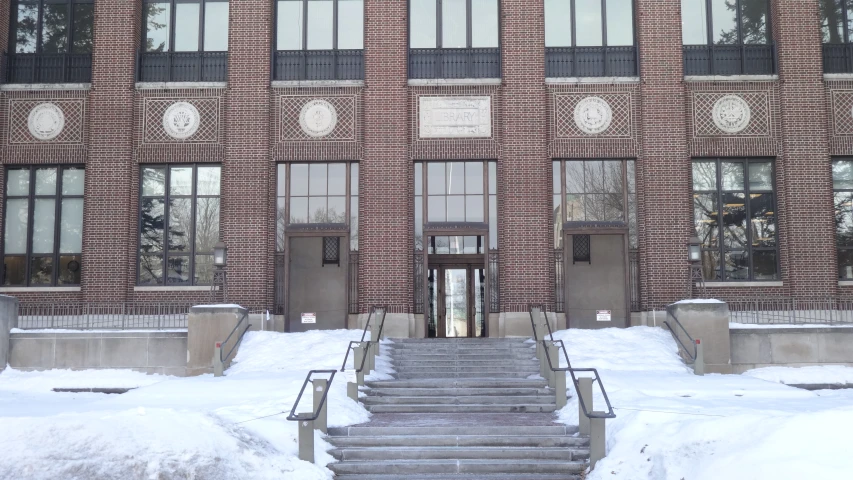 this is a building with stairs in the snow