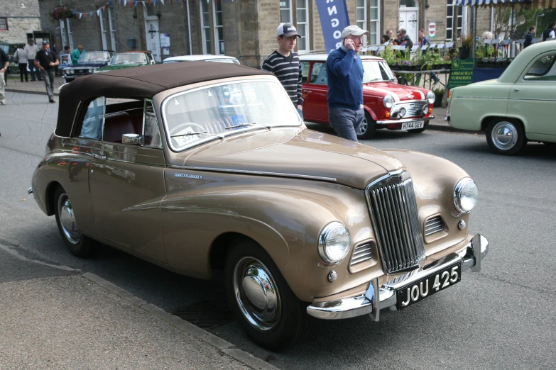 the older car has been painted in many colors