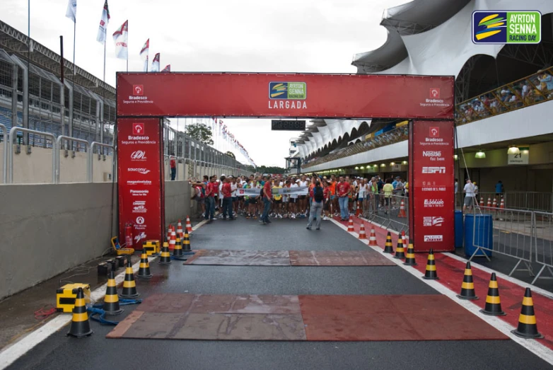 the red race finish gate is surrounded by yellow and red barriers