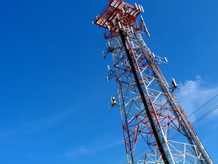 a tower with a cellphone mounted to it's side