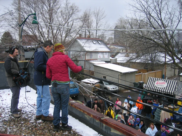 a woman on a phone at an outdoor event