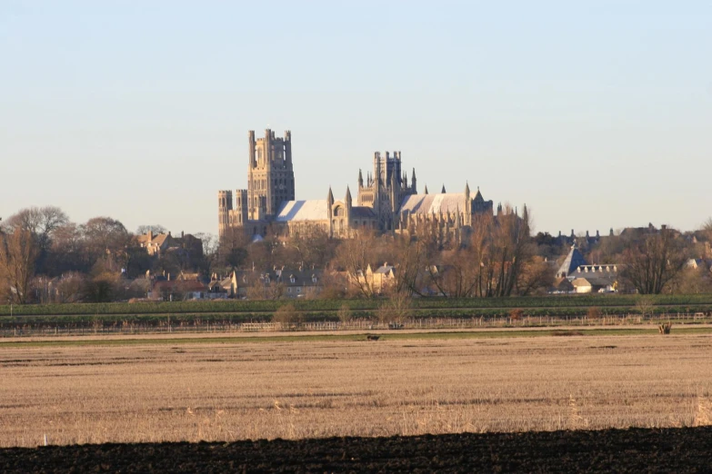 a picture of an old castle in the distance