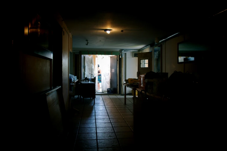 a long hallway leading to an open door