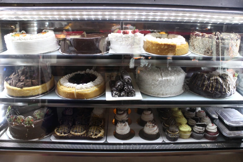 a large selection of cakes and desserts