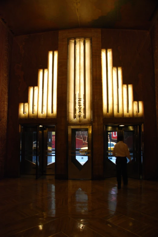 a building is lit with lights that look like strings of lights