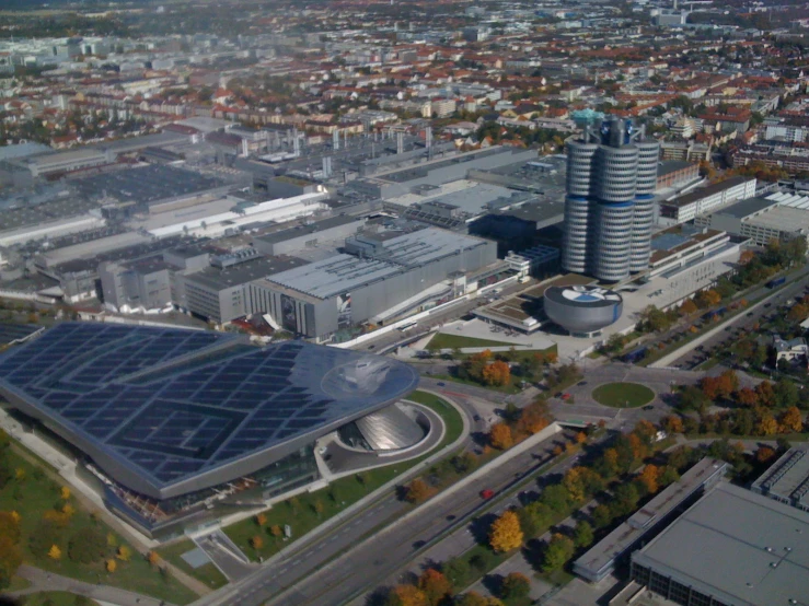 aerial view of large buildings on a wide city street