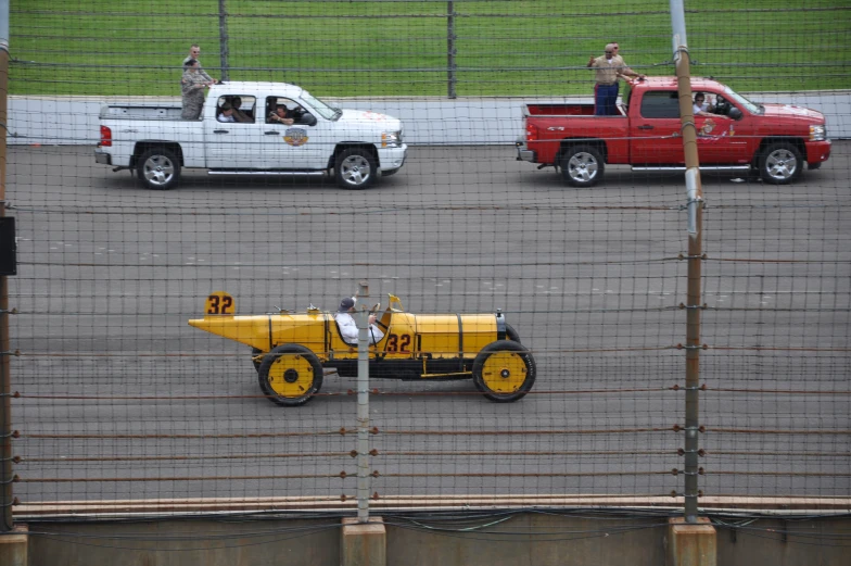 trucks and people in the cage of an airport